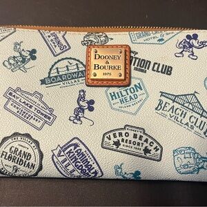 Dooney & Bourke White and Blue Wallet with Retro Travel Stamps